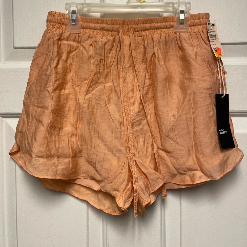 peach/light orange shorts